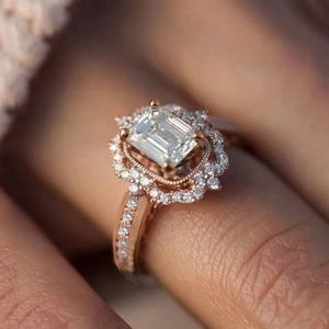 Vintage Inspired Rose Gold Ring with Emerald Cut CZ Center Stone and Halo Band